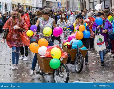 People On Bikes With Carts Filled With Balloons Attending The Gay Pride Parade Also Known As