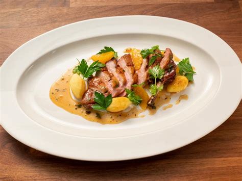 Pan Roasted Duck Breast With Orange Sauce And Tourne Potatoes Recipe