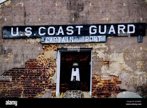 The United States Coast Guard Captain Of The Port Written On A Brick