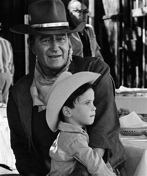 John Wayne and son Ethan on the set of "El Dorado." Old Tucson, AZ [19 ...