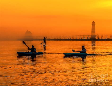 Kayaks At Sunset Grand Haven Light Photograph By Nick Zelinsky Jr