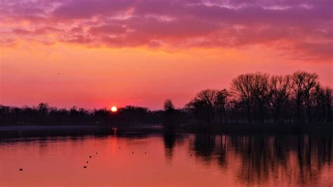 Premium Photo | Beautiful purple sunset on the lake