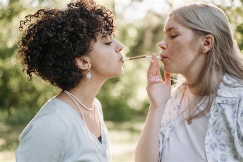 Women Smoking Cigarettes · Free Stock Photo