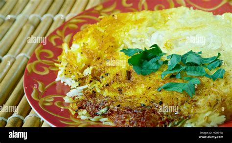 Chelo rice - Persian Steamed White Rice with a Golden Crust Stock Photo - Alamy