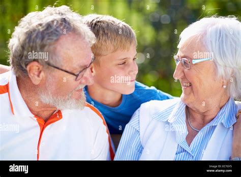 Grandparents With Grandson Outdoors Stock Photo Alamy