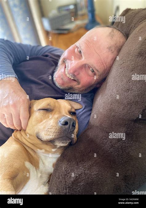 Dad and his dog Stock Photo - Alamy