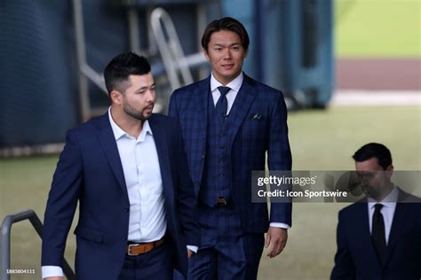 Newly acquired Los Angeles Dodgers pitcher Yoshinobu Yamamoto walks... News Photo - Getty Images