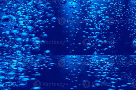 Defocus Blurred Transparent Blue Colored Clear Calm Water Surface