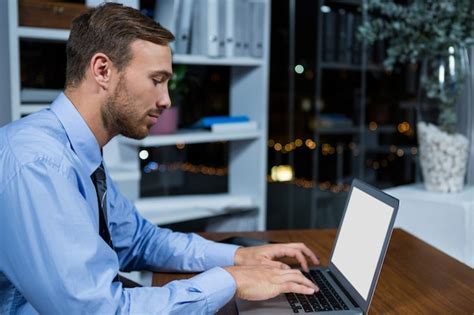 Premium Photo Businessman Working On Laptop