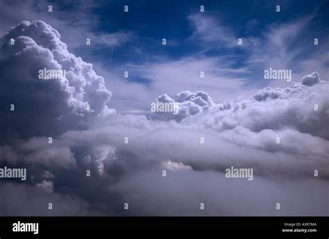 fluffy white clouds from airplane Stock Photo - Alamy