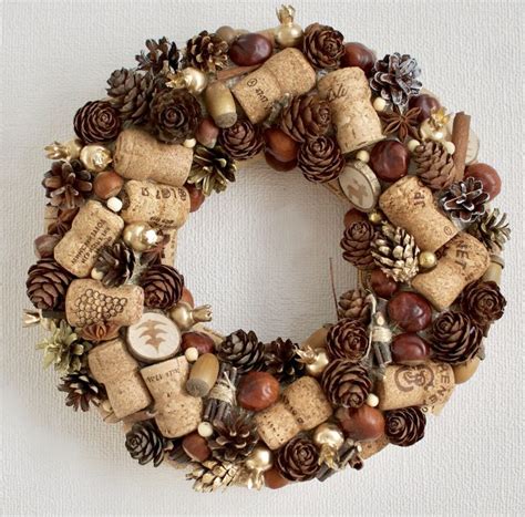 A Wreath Made Out Of Wine Corks And Pine Cones