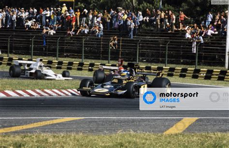 Ronnie Peterson Lotus E Ford Leads Niki Lauda Ferrari B And