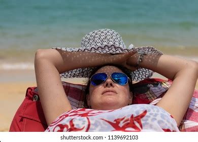 Woman Naked White Hat Sunglasses Lies Stock Photo 1139692103 Shutterstock