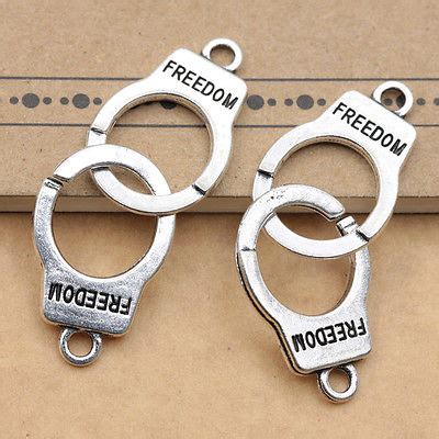 X Retro Style Antique Silver Freedom Mini Handcuffs Charm