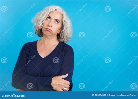 Mature Woman Looking Up With Expression Of Boredom Stock Image Image