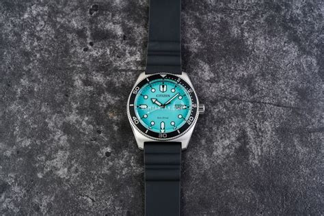 Citizen Eco Drive Aw X Turquoise Dial Black Urathane Strap