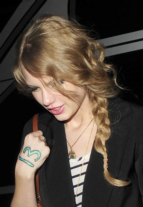 Taylor Swift Long Loose Braided Ponytail Hairstyles Hairstyles Weekly