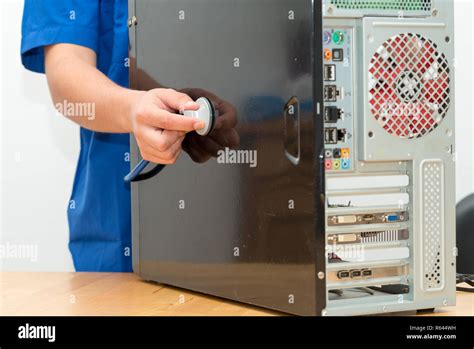 Technician Repairing Broken Pc Desktop Computer With Stethoscope Stock