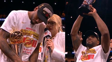 Kawhi Leonard Is Presented With The Bill Russell Nba Finals Mvp Trophy