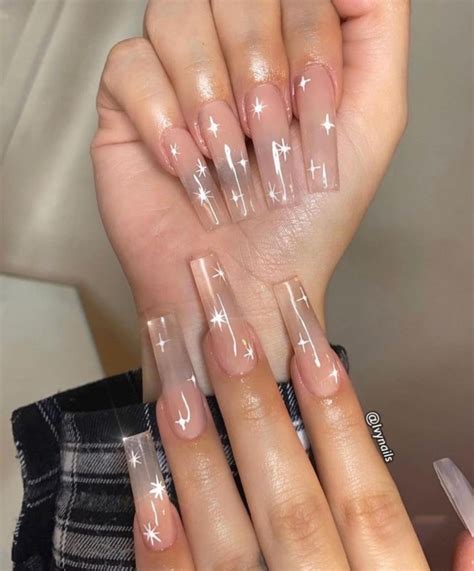 40 Nude Nail Designs For Any Occasion — White Swirl Nude Nails