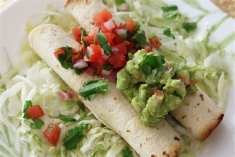 Baked Chicken Taquitos Recipe In The Slow Cooker Busy Loving Life