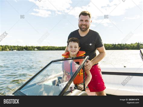 Man Driving Boat On Image And Photo Free Trial Bigstock