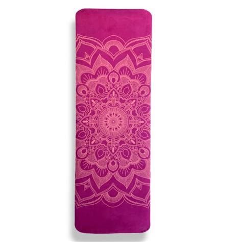 The Yoga Mat Is Pink And Has An Intricate Design On It As Well As A Purple