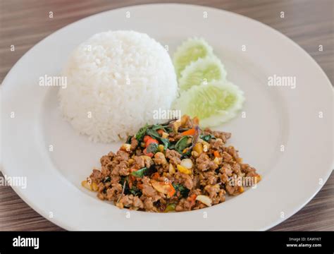 Steamed Rice Topped With Stir Fried Minced Pork Chili And Basil Stock