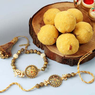 Buy Send Antique Bhaiya Bhabhi Rakhi With Besan Ladoo Online Igp