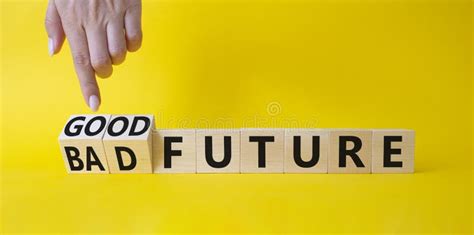 Good And Bad Future Symbol Businessman Hand Turnes Wooden Cubes And