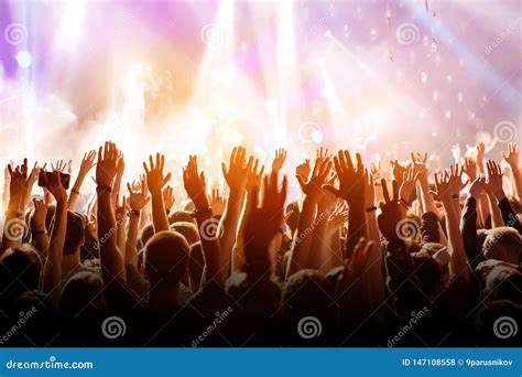 Crowd with Raised Hands on Music Concert Stock Photo - Image of live, arena: 147108558