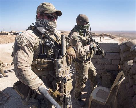 Canadian special forces look over a Peshmerga observation post on Feb ...