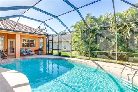 Waterfront Home In Gated Community Boasts Private Pool And Amazing