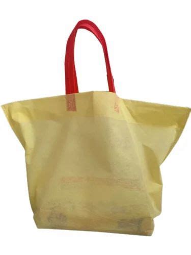 Yellow And Red Plain Loop Handle Non Woven Shopping Bag Capacity 10kg