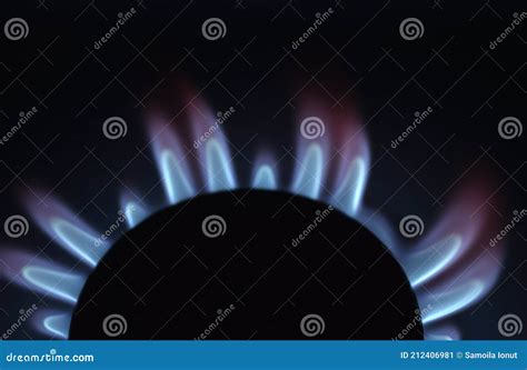 Natural Gas Burning A Blue Flames On Black Background Stock Image