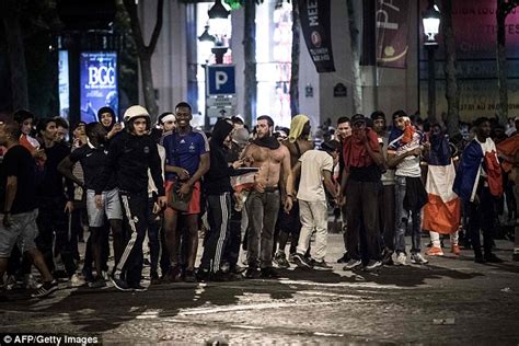 France Hooligans Clash With Riot Police In Paris After Euro 2016 Win