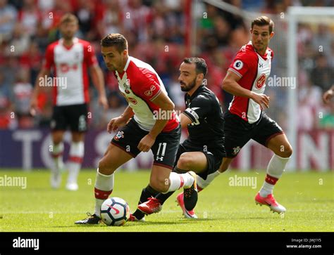 Southampton S Dusan Tadic Left And Swansea City S Leon Britton Battle