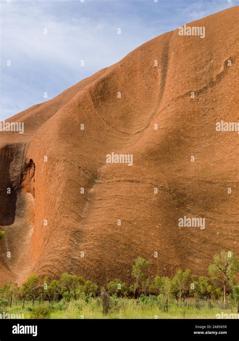 Uluru Or Ayers Rock Is A Massive Sandstone Monolith In The Heart Of