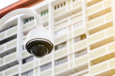 Modern Public 360 Degree Cctv Cameras With Blurred City Building