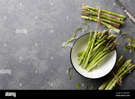 Peeling And Cooking Fresh Raw Asparagus Stock Photo Alamy