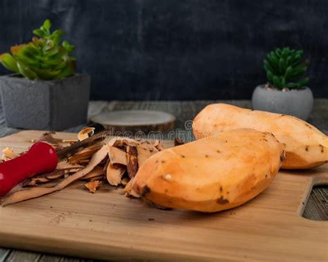 Peeled Sweet Potato On A Cutting Board Stock Image Image Of Healthy