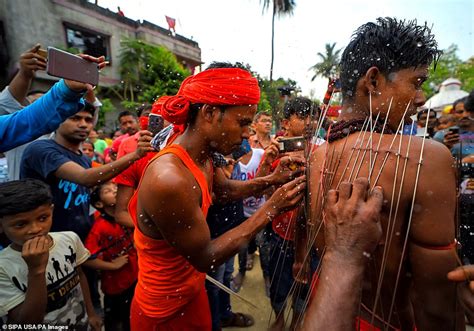 Hindu Devotees Force Skewers Through Their Flesh To Satisfy The God