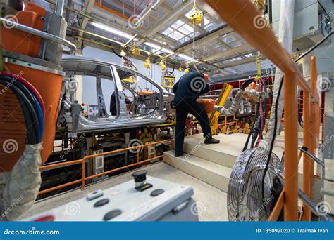 Workers Assemble A Vehicle Body Process Of Welding Cars Modern