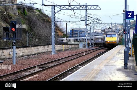 An East Coast Train Arrives At Platform 2 At Edinburgh Waverley Station