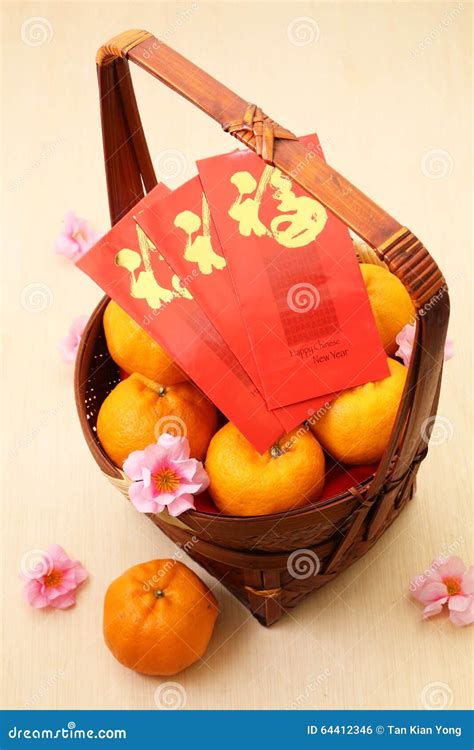 Mandarin Oranges in Basket with Chinese New Year Red Packets Stock Photo - Image of festival ...