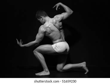 Muscular Naked Male Model Thinker Pose Stock Photo