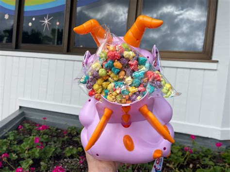 PHOTOS: Figment Popcorn Bucket Returns With New EPCOT40 Strap for 2023 EPCOT International ...