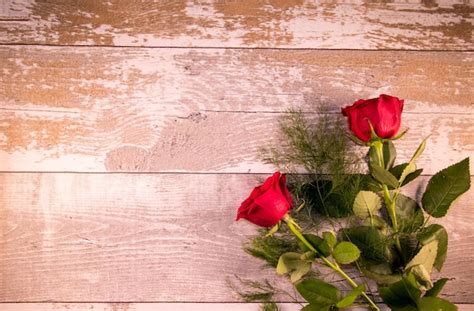 Premium Photo Close Up Of Red Rose On Wood