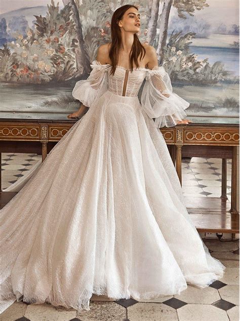 65 robes de mariée avec des manches bouffantes impressionnantes