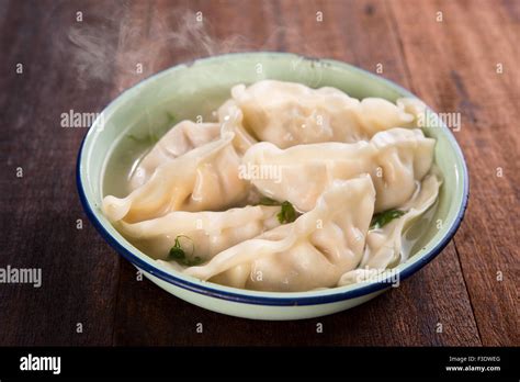 Fresh Dumplings Soup On Plate With Hot Steams Chinese Gourmet On